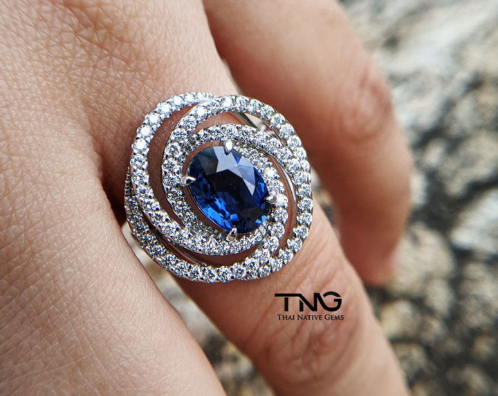 Blue Sapphire Swirl Design Diamond Engagement Ring